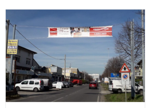 Striscione pubblicitario stradale sospeso su carreggiata formato 700x100